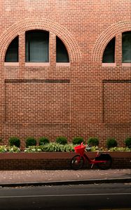 Preview wallpaper bicycle, red, building, road