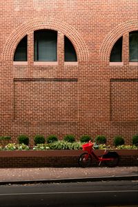 Preview wallpaper bicycle, red, building, road