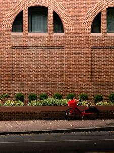 Preview wallpaper bicycle, red, building, road