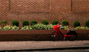 Preview wallpaper bicycle, red, building, road