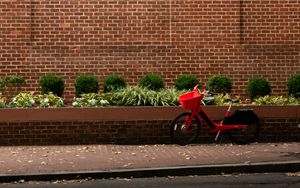 Preview wallpaper bicycle, red, building, road