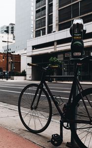 Preview wallpaper bicycle, street, buildings, city