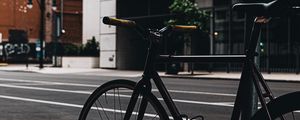 Preview wallpaper bicycle, street, buildings, city