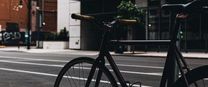 Preview wallpaper bicycle, street, buildings, city