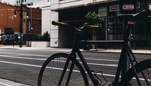 Preview wallpaper bicycle, street, buildings, city