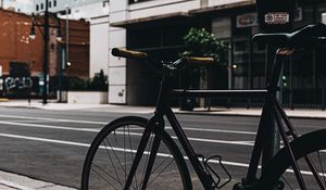 Preview wallpaper bicycle, street, buildings, city