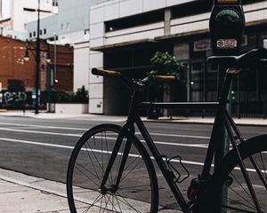 Preview wallpaper bicycle, street, buildings, city