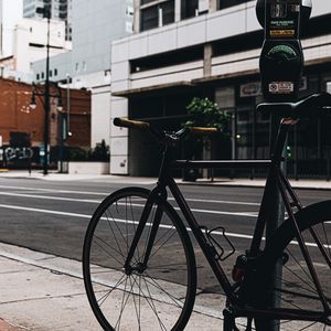 Preview wallpaper bicycle, street, buildings, city