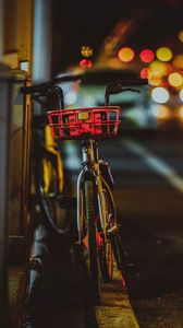 Preview wallpaper bicycle, street, night, glare, bokeh