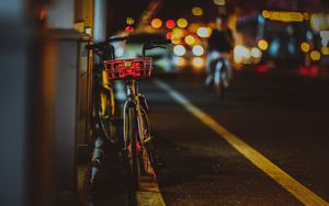 Preview wallpaper bicycle, street, night, glare, bokeh