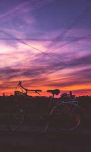 Preview wallpaper bicycle, sunset, sky, road