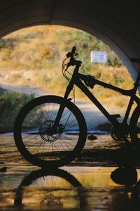 Preview wallpaper bicycle, tunnel, underground, water, reflection