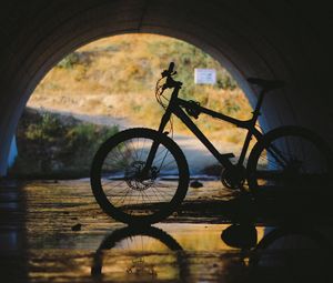 Preview wallpaper bicycle, tunnel, underground, water, reflection