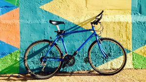 Preview wallpaper bicycle, wall, colorful, sunlight, shadow