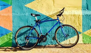 Preview wallpaper bicycle, wall, colorful, sunlight, shadow