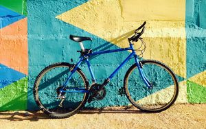 Preview wallpaper bicycle, wall, colorful, sunlight, shadow