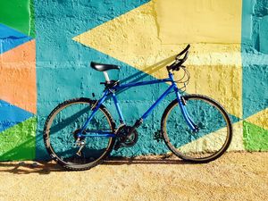 Preview wallpaper bicycle, wall, colorful, sunlight, shadow