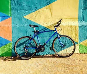 Preview wallpaper bicycle, wall, colorful, sunlight, shadow