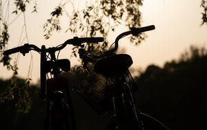 Preview wallpaper bicycles, bikes, silhouettes, twilight, dark