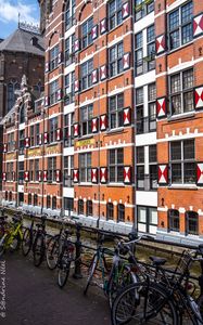 Preview wallpaper bicycles, canal, building, facade, architecture