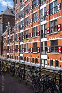 Preview wallpaper bicycles, canal, building, facade, architecture