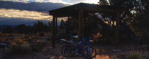 Preview wallpaper bicycles, gazebo, parking, sunset, puddle, travel, utah