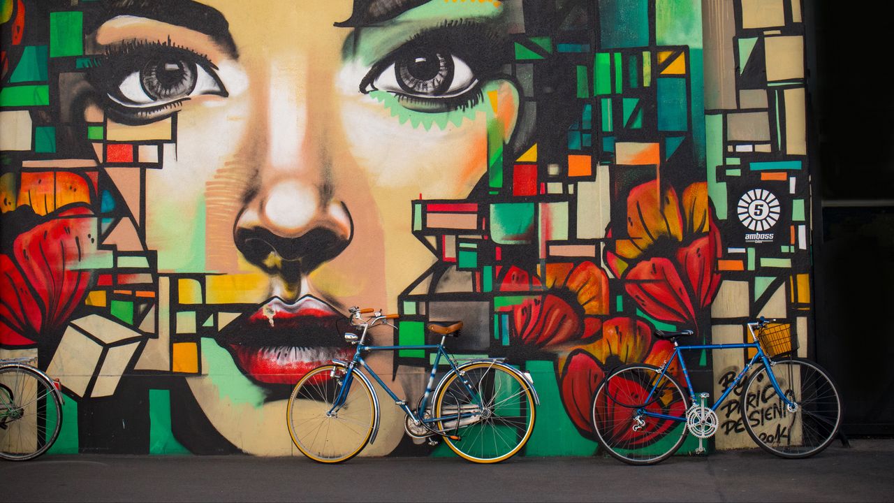 Wallpaper bicycles, graffiti, face, wall
