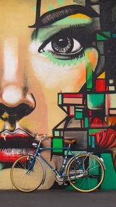 Preview wallpaper bicycles, graffiti, face, wall