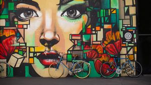 Preview wallpaper bicycles, graffiti, face, wall