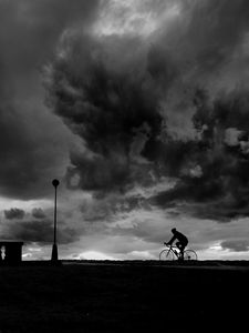 Preview wallpaper bicyclist, silhouette, bw, clouds, night