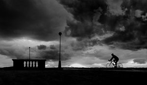 Preview wallpaper bicyclist, silhouette, bw, clouds, night