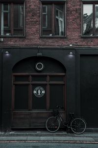 Preview wallpaper bike, building, facade, street, city