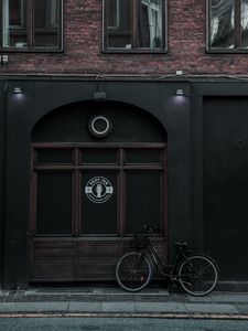 Preview wallpaper bike, building, facade, street, city