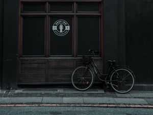 Preview wallpaper bike, building, facade, street, city