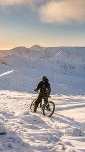 Preview wallpaper bike, cyclist, mountains, snow, winter