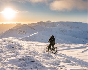 Preview wallpaper bike, cyclist, mountains, snow, winter