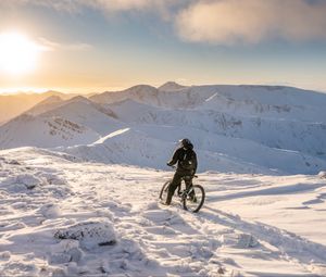 Preview wallpaper bike, cyclist, mountains, snow, winter