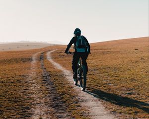 Preview wallpaper bike, cyclist, road, field