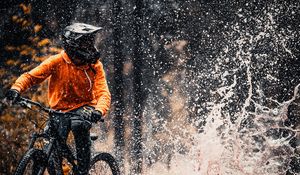 Preview wallpaper bike, cyclist, spray, puddle, extreme