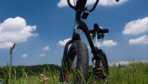 Preview wallpaper bike, field, grass, greenery