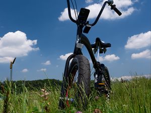 Preview wallpaper bike, field, grass, greenery