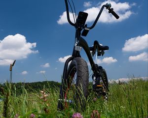 Preview wallpaper bike, field, grass, greenery