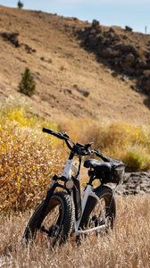Preview wallpaper bike, grass, field, hills
