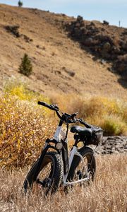 Preview wallpaper bike, grass, field, hills