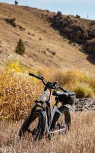 Preview wallpaper bike, grass, field, hills