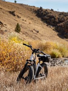 Preview wallpaper bike, grass, field, hills