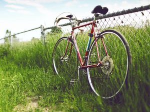 Preview wallpaper bike, grass, street