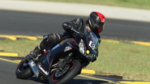 Preview wallpaper biker, motorcycle, racing