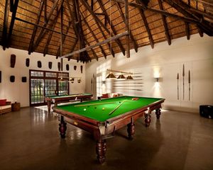 Preview wallpaper billiards, interior, style, billiard cue, ball, table, sofa, tv, bathroom