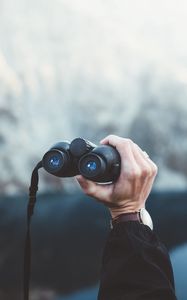 Preview wallpaper binoculars, hand, watch, focus